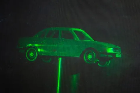 White light hologram of a car model