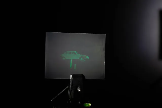 White light hologram of a model car from different viewing angles